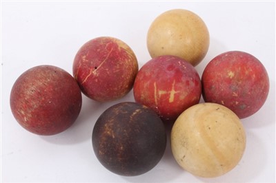 Lot 970 - Set of seven ivory and stained ivory billiard balls