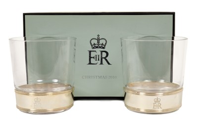 Lot 73 - HM Queen Elizabeth II – Royal Christmas gift 2010 – pair glass tumblers with silver plated collars