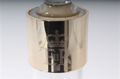 Lot 75 - HM Queen Elizabeth II, Christmas gift, decanter, stopper with silver plate collar; tray; cake tin