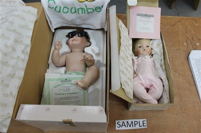 Lot 57 - Dolls – Ashton Drake selection – Pretty as a Picture, Lullaby Baby, Hannah needs a hug, Sugar Plum, A bit of Sunshine, Cool as a Cucumber, Pumpkin, Tickles, Peanut, all boxed (9)