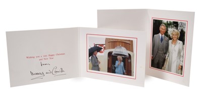 Lot 85 - TRH The Prince of Wales and The Duchess of Cornwall – two Christmas cards, twin gilt ciphers, colour photographs