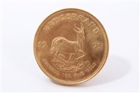Lot 209 - South Africa – gold Krugerrand 1975 (1oz fine gold).  AU (1 coin)