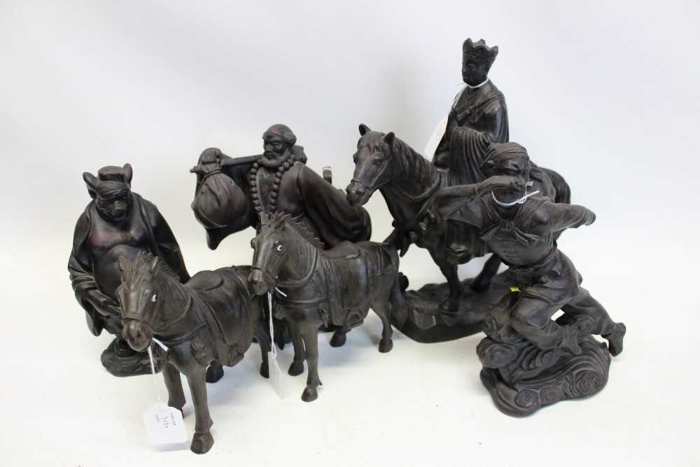 Lot 3582 - Group of Chinese metal figures – including Monkey King, Pigsy and others, together with two carved horses (6)