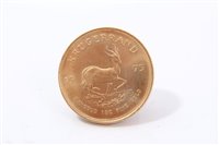 Lot 215 - South Africa – gold Krugerrand 1975 (1oz fine gold) (obverse edge knock), otherwise AU (1 coin)