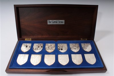 Lot 89 - Set of twelve silver shield-shape plaques depicting the Royal Arms from 1195 until 1977, commemorating the Silver Jubilee