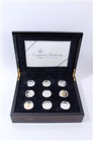 Lot 246 - G.B. The Royal Mint Silver Proof Crown Set - Eightieth Birthday Elizabeth II 2006 (x 9) (N.B.  the set should consist of 17 coins), housed in plush-lined two-drawer wood cabinet with some Certifica...