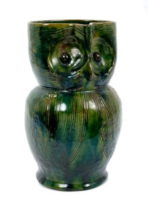 Lot 261 - Late 19th century Farnham pattern pottery owl jug with green and brown glaze and incised decoration