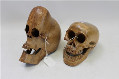 Lot 3592 - Carved wooden skull and one other (2)