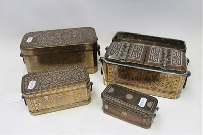 Lot 3599 - Four antique Eastern brass and inlaid silver caskets