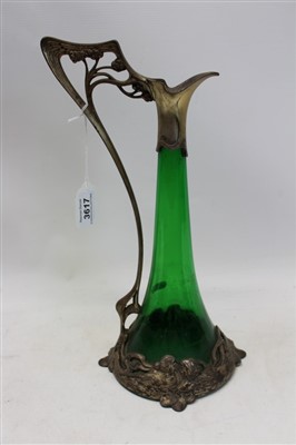 Lot 3617 - Late 19th / early 20th century WMF green glass claret jug with Art Nouveau-style mounts