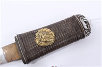 Lot 847 - Japanese Tanto dagger with ribbed wooden hilt, in black lacquer scabbard with white metal mounts, 26.5cm in overall length.
