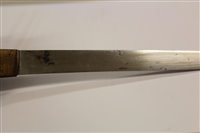 Lot 847 - Japanese Tanto dagger with ribbed wooden hilt, in black lacquer scabbard with white metal mounts, 26.5cm in overall length.