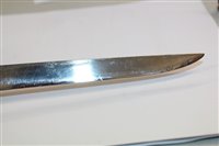 Lot 847 - Japanese Tanto dagger with ribbed wooden hilt, in black lacquer scabbard with white metal mounts, 26.5cm in overall length.