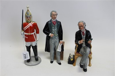 Lot 2109 - Three Royal Doulton figures - The Lifeguard HN2781, The Doctor HN2858 and Statesman HN2859