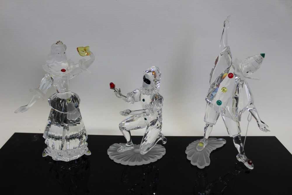 Lot 2119 - Three Swarovski crystal annual edition figures - Masquerade Pierrot 1999, Masquerade Columbine 2000 and Masquerade Harlequin 2001, all boxed with certificates