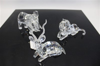 Lot 2120 - Three Swarovski crystal annual edition Inspiration Africa figures - The Elephant 1993, The Kudu 1994 and The Lion 1995, all boxed with certificates