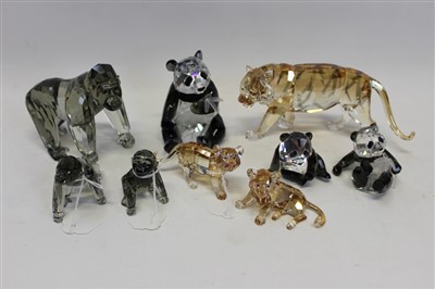 Lot 2122 - Five Swarovski crystal Endangered Wildlife figures - Panda and baby, Gorilla and baby and Tiger in three boxes with certificates