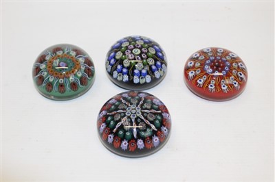 Lot 2131 - Four Vasart (pre-1964) glass paperweights with millefiori decoration – including three cartwheels