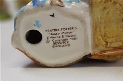 Lot 2152 - Eleven Beswick Beatrix Potter figures, plus a set of Beatrix Potter books