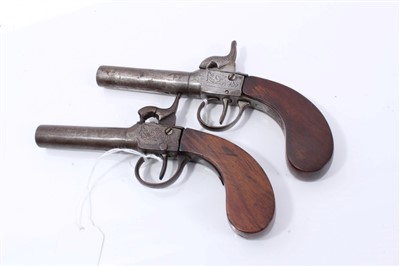 Lot 918 - Pair of 19th Century percussion box lock pocket pistols with turn off barrels and Birmingham proofs with walnut slab sided butts