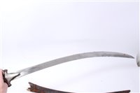 Lot 851 - 19th Century Indian Tulwar with disc pommel, scroll guard and curved blade in leather scabbard