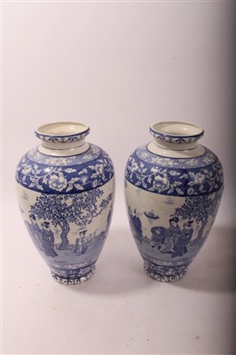 Lot 2179 - Pair of late 19th century blue and white vases with oriental figure decoration