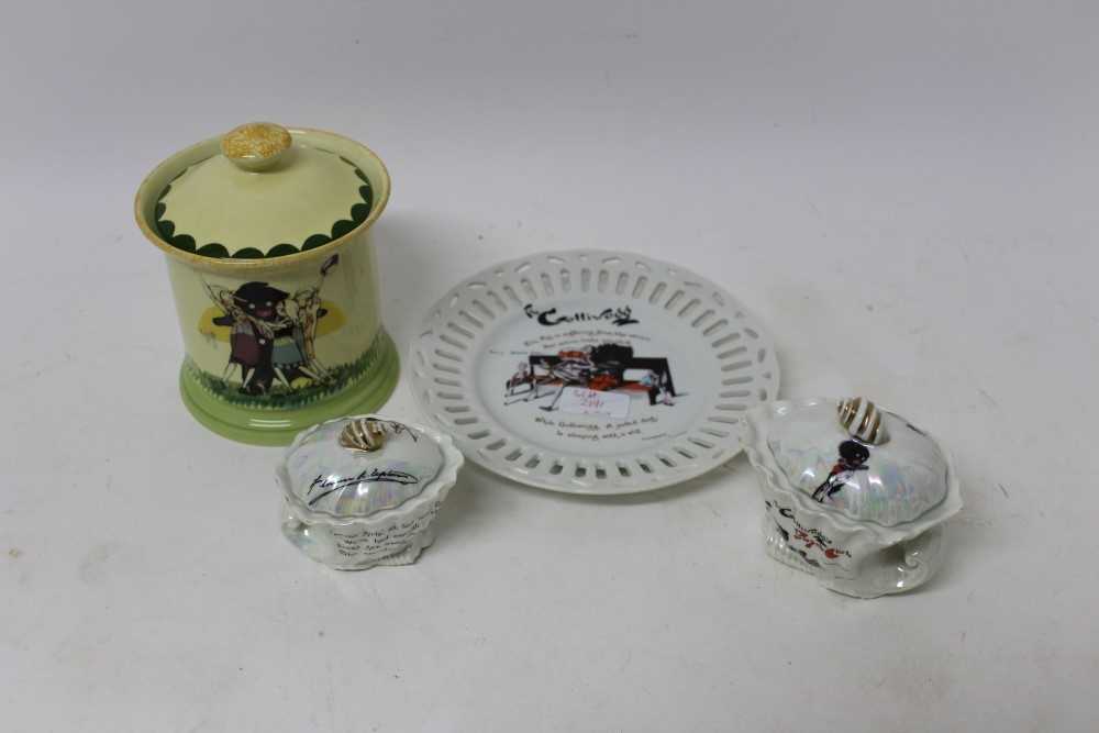Lot 2191 - Carlton Ware ‘Golliwog’ biscuit barrel and cover,
‘Golliwog’ plate and two matching pots with lids (4)