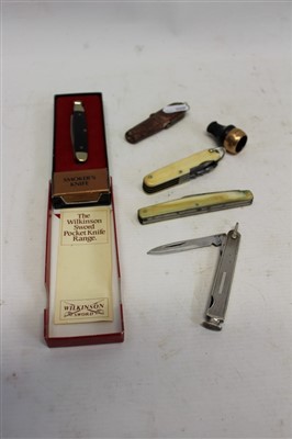 Lot 3637 - Collection of five pocket knives - including a multi-bladed knife with ivory scales, by Clements, a novelty knife in the form of a naked female, with purse case, two smokers' knives and one other