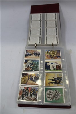 Lot 54 - Cigarette cards - selection in album and loose - including Ardath Britains Defenders, Wills Merchant Ships of the World, plus other trade and reproduction issues, postcards - including Nostalgia, etc