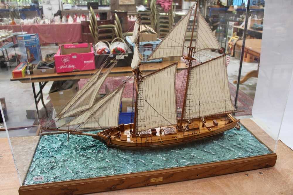 Lot 3605 - Large scratch-built model of an armed schooner, Harvey 1847, under full sale, in a perspex case, 107cm overall length