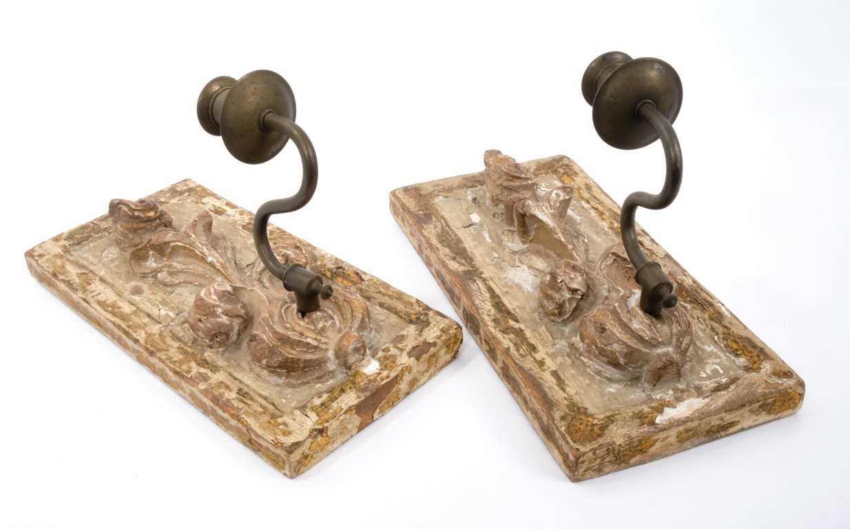 Lot 821 - Pair of 18th century carved lime wood wall sconces