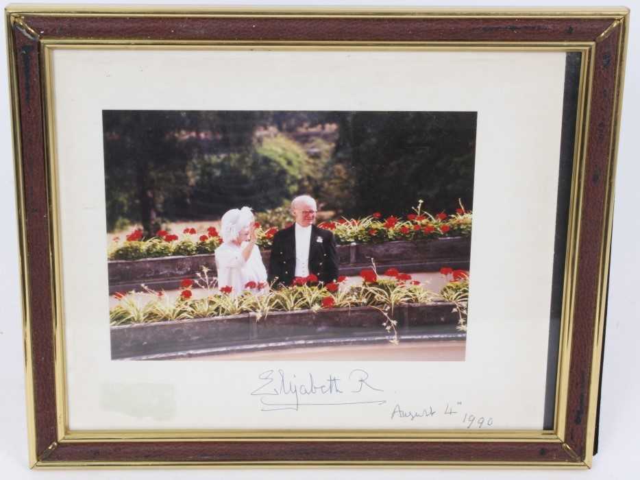 Lot 61 - HM Queen Elizabeth The Queen Mother, signed photograph of Her Majesty with her page Reg Wilcox