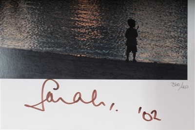 Lot 64 - Sarah, Duchess of York – signed limited edition photograph of a child on a beach at sunset, '02