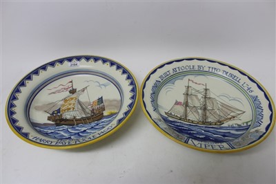 Lot 2164 - Two Poole Pottery chargers painted by Ruth Pavely and decorated with ships, impressed marks and titled verso