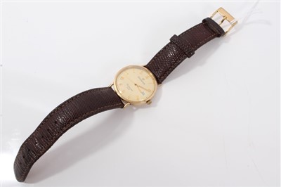 Lot 3300 - Gold (9ct) cased Sovereign wristwatch on brown leather strap