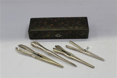 Lot 3677 - Four good quality Victorian and later silver glove stretchers in Victorian glovebox (5)