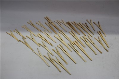 Lot 3680 - Collection of twenty-two Victorian carved ivory glove stretchers and lot bone glove stretchers (30+)