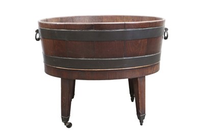 Lot 1401 - George III mahogany and brass bound oval wine cooler