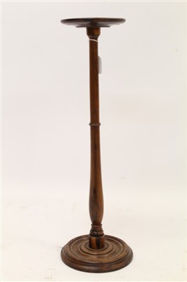 Lot 1406 - Regency turned yew candle stand with circular top, turned column on turned base, 15cm diameter x 61cm high