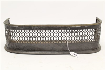 Lot 1429 - Early 19th century pierced metal fender of narrow bowed form, 54cm wide