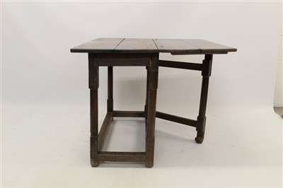 Lot 1432 - Late 17th century oak single drop-leaf table with gun barrel turned legs and square stretchers, 82cm deep x 86cm wide x 67cm high extended