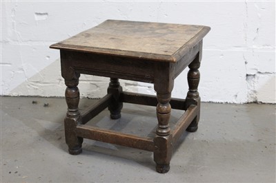 Lot 1437 - 17th century and later oak joint stool with square moulded top on turned and block understructure, converted from an upholstered stool, 38cm wide