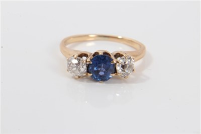 Lot 3312 - Diamond and Sapphire three stone ring