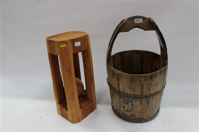 Lot 3721 - Old metal bound wooden bucket with integral handle, together with a pine chainsaw sculpture