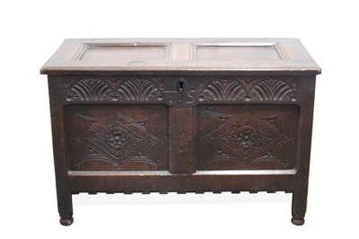 Lot 1457 - Good 17th century carved and panelled oak coffer with panelled top, carved arcaded frieze with initials T.S. and two lozenge carved panels, castellated apron with stile legs and turned feet, 95cm w...