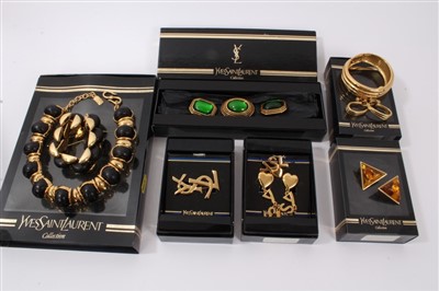 Lot 3320 - Collection Yves Saint Laurent gilt metal jewellery