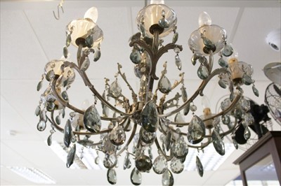 Lot 182 - A large cast metal and glass twelve-light chandelier, together with one other smaller with six lights (2)