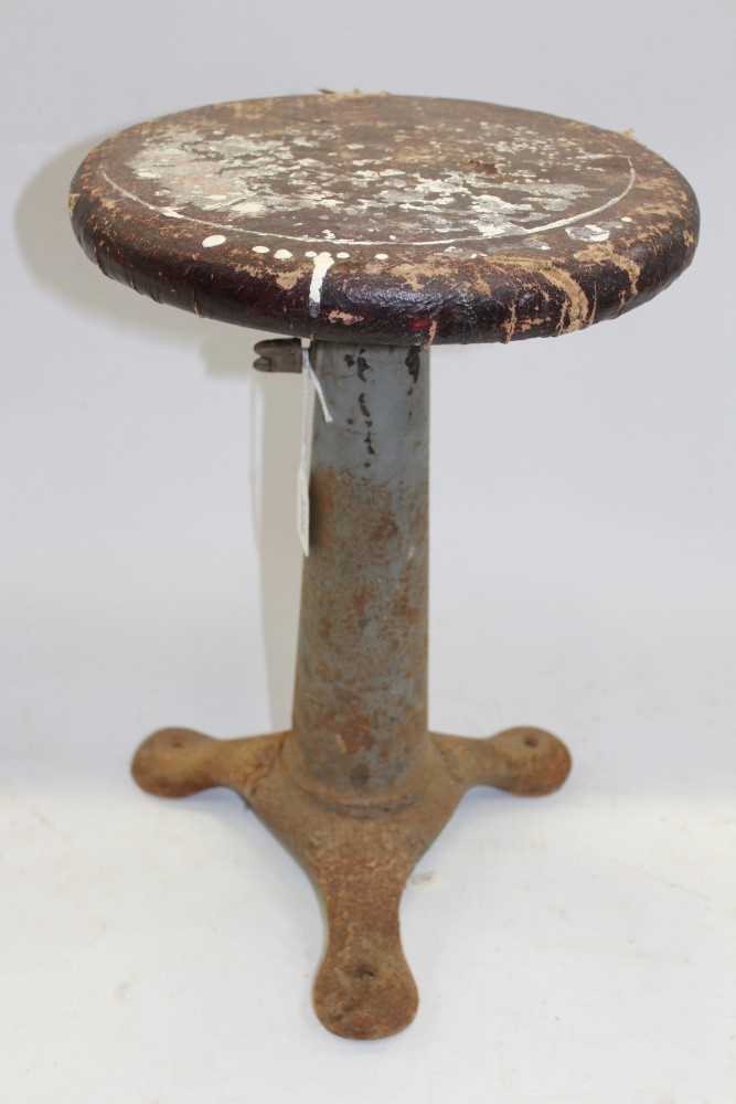 Lot 3738 - Vintage cast iron Singer machinists’ stool with revolving wooden seat