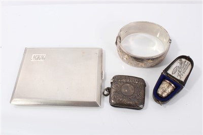 Lot 3368 - Victorian silver vesta case, Art Deco silver cigarette case, silver bangle and a silver thimble in case