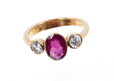 Lot 626 - Ruby and diamond three stone ring